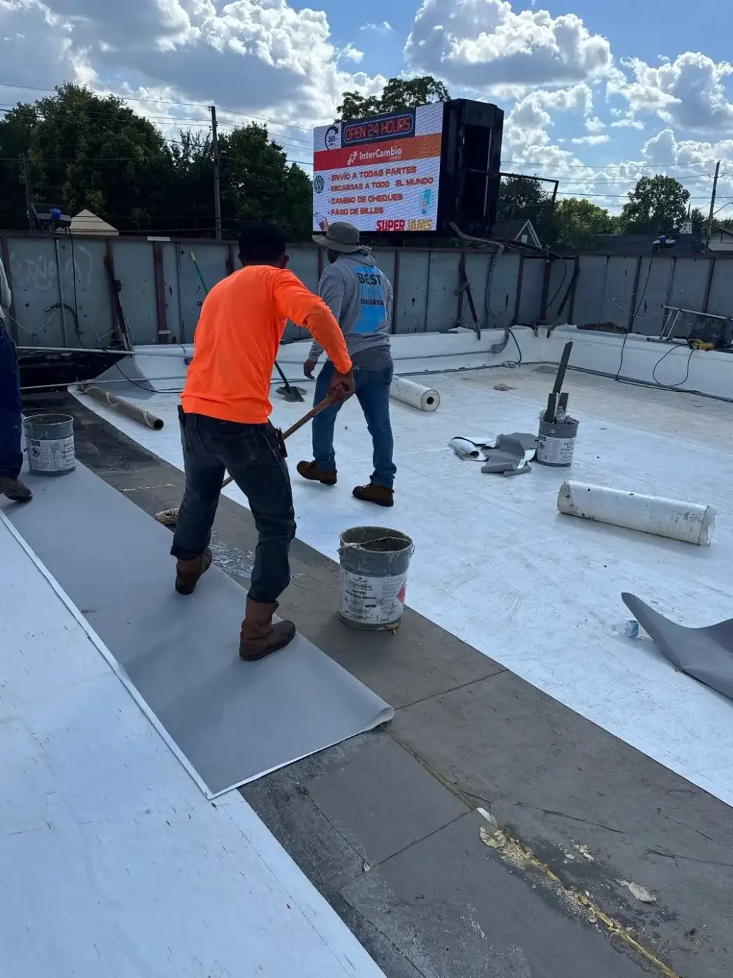Tarping and dry-in on a Fairmount commercial roof